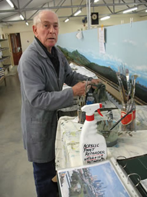 Owen Robinson painting Scenery for AMRA (Q)'s Club Layout "Mayne"