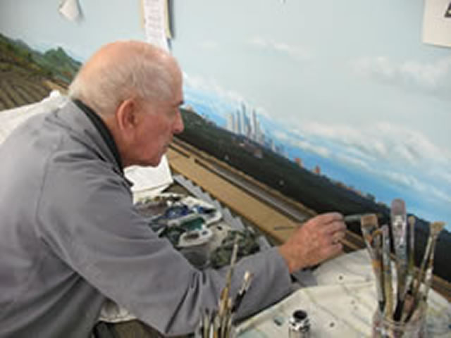 Owen Robinson painting Scenery for AMRA (Q)'s Club Layout "Mayne"